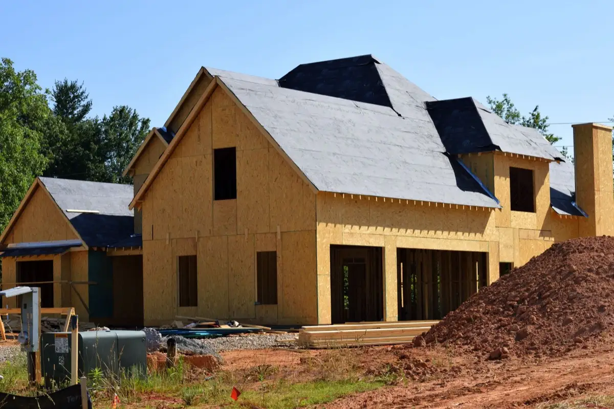 House with new roof decking and synthetic underlayment during a roof replacement in Greenwood, IN